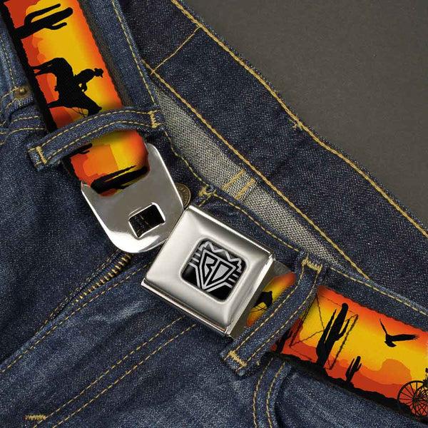 Buckle-Down BD Wings Logo CLOSE-UP Full Color Black Silver Seatbelt Belt - Cowboy Silhouette/Western Landscape Reds/Black Webbing