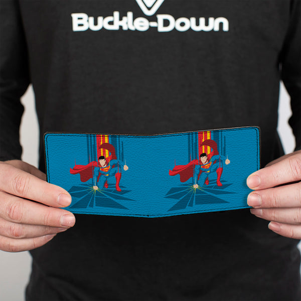 Buckle-Down Bi-Fold Wallet - Superman Down Punch Silhouette Pose Blues/Reds/Yellow