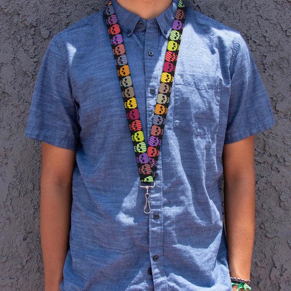 Buckle-Down Lanyard - 1.0" - Checker & Stripe Skulls Black Multi Neon