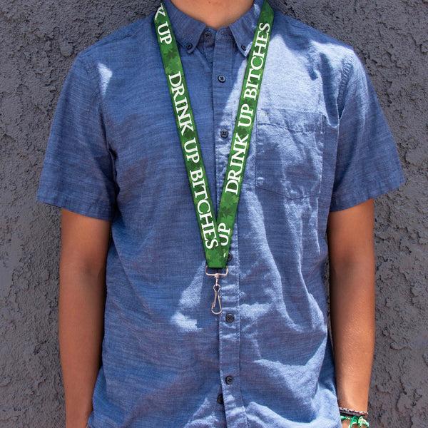 Buckle-Down Lanyard - 1.0" - St Pat's DRINK UP BITCHES Stacked Shamrocks Greens White
