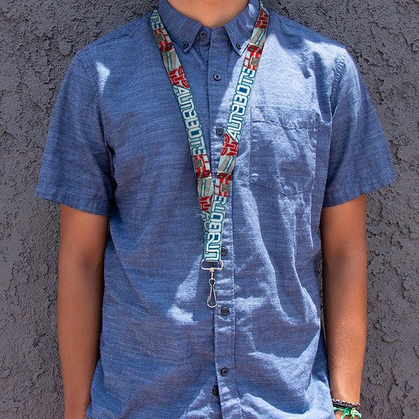Buckle-Down Lanyard - 1.0" - Transformers AUTOBOTS Optimus Prime Semi Truck Collage Light Blue